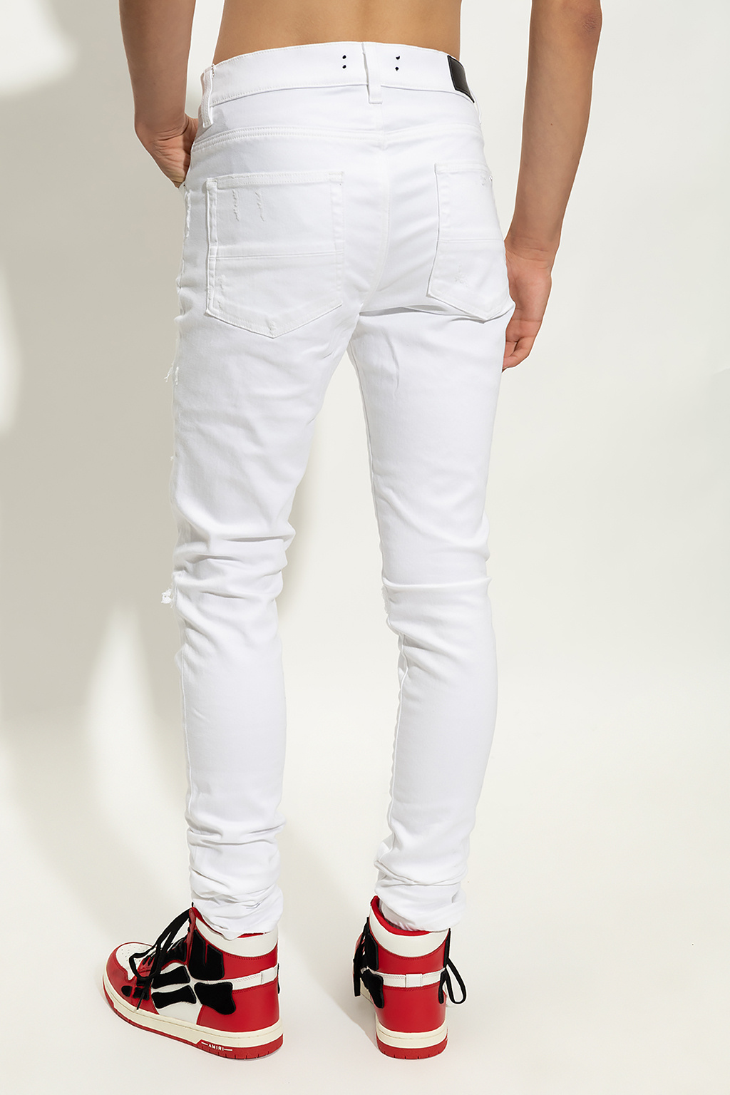White Jeans with vintage effect Amiri